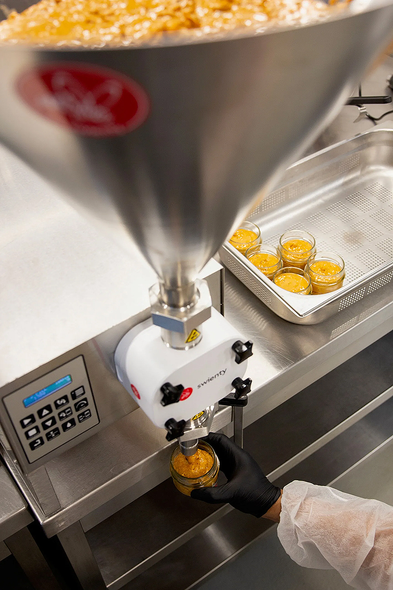 Peanut butter being filled at Call Me Nuts